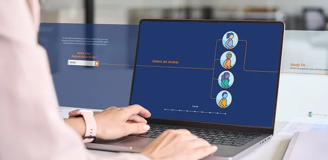 A person is using a laptop that displays an interactive interface with a dark blue background. The screen shows a step in a process where the user is prompted to "Select an Avatar" from a set of illustrated character icons connected by flow lines. Additional fields on the screen include "Name Your Patient/Avatar" and "Study TA." The user appears to be navigating a clinical or educational tool, and the workspace includes documents and a tablet nearby in a bright office environment.
