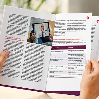 A person holding open a printed booklet featuring a white paper. The left page contains several columns of text and a photo of a doctor speaking on a tablet screen, suggesting a telehealth consultation. The right page includes more text, bold section headings, and a structured table with icons, outlining key findings or comparisons. The setting is bright with natural light and a plant blurred in the background.