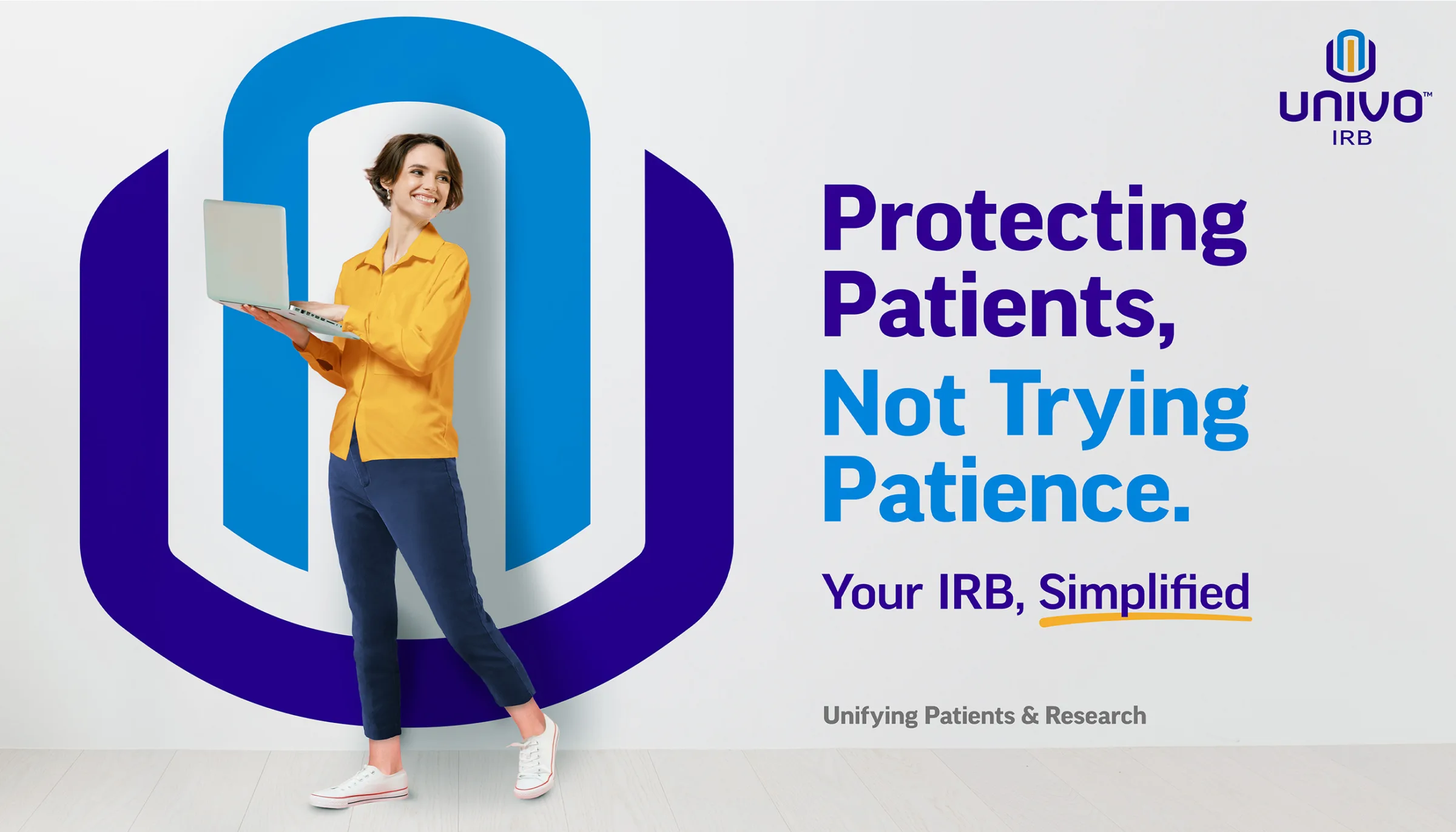 Univo IRB Big idea graphic. A smiling woman holding a laptop stands in front of a large stylized shield logo. Text reads: 'Protecting Patients, Not Trying Patience. Your IRB, Simplified.' Tagline at the bottom says 'Unifying Patients & Research.' The Univo IRB logo is shown in the top right corner.