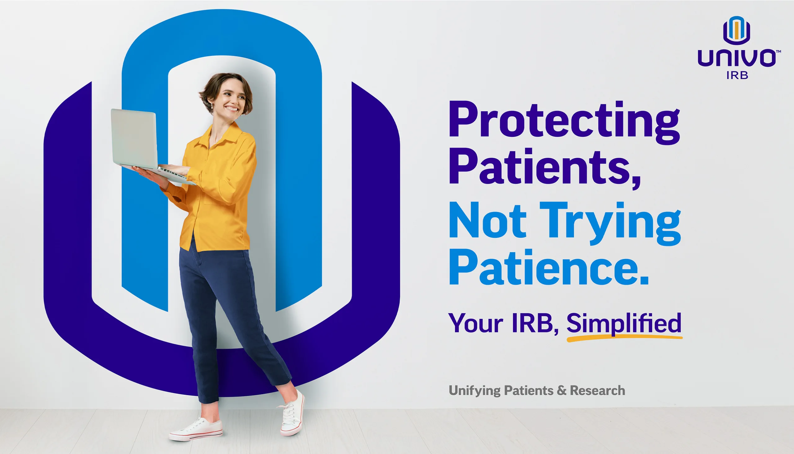 Univo IRB Big idea graphic. A smiling woman holding a laptop stands in front of a large stylized shield logo. Text reads: 'Protecting Patients, Not Trying Patience. Your IRB, Simplified.' Tagline at the bottom says 'Unifying Patients & Research.' The Univo IRB logo is shown in the top right corner.