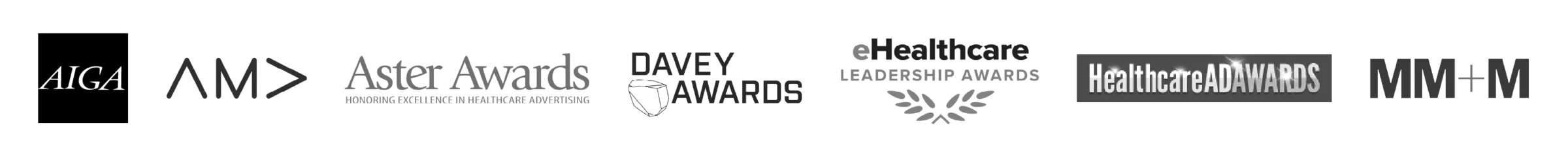 A row of black-and-white logos representing various industry awards, including AIGA, AMA, Aster Awards, Davey Awards, eHealthcare Leadership Awards, Healthcare Ad Awards, and MM+M.