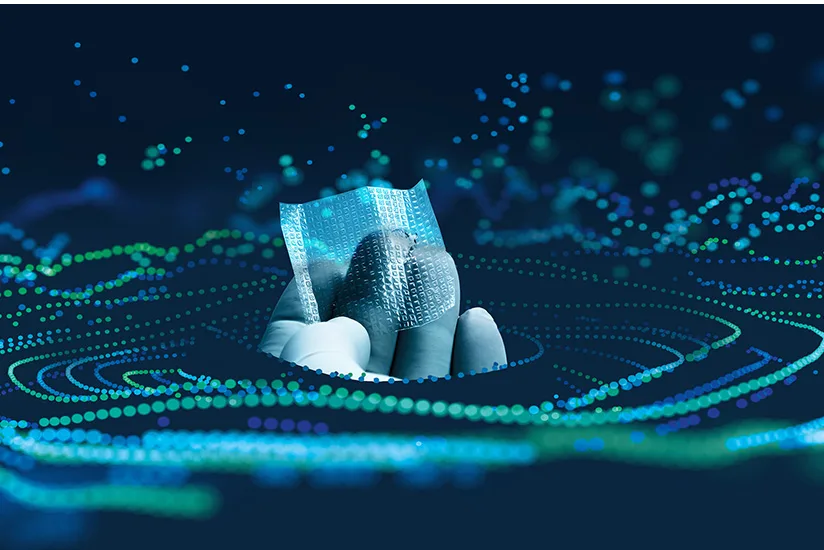 An image showcasing Sanuwave's BIOVANCE human connective tissue matrix product. The patch, shown in the hands of a gloved medical professional, appears to be floating within a backdrop of abstract blue and green dots, symbolizing energy and regenerative processes. The visual emphasizes BIOVANCE's role in supporting wound healing by providing a protective cover and stimulating tissue repair.